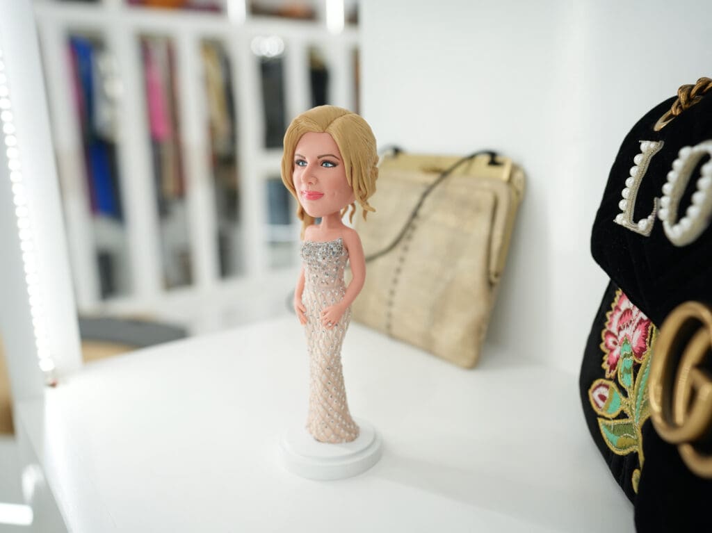 Theresa Roemer's Bobblehead has a space on the shelf.