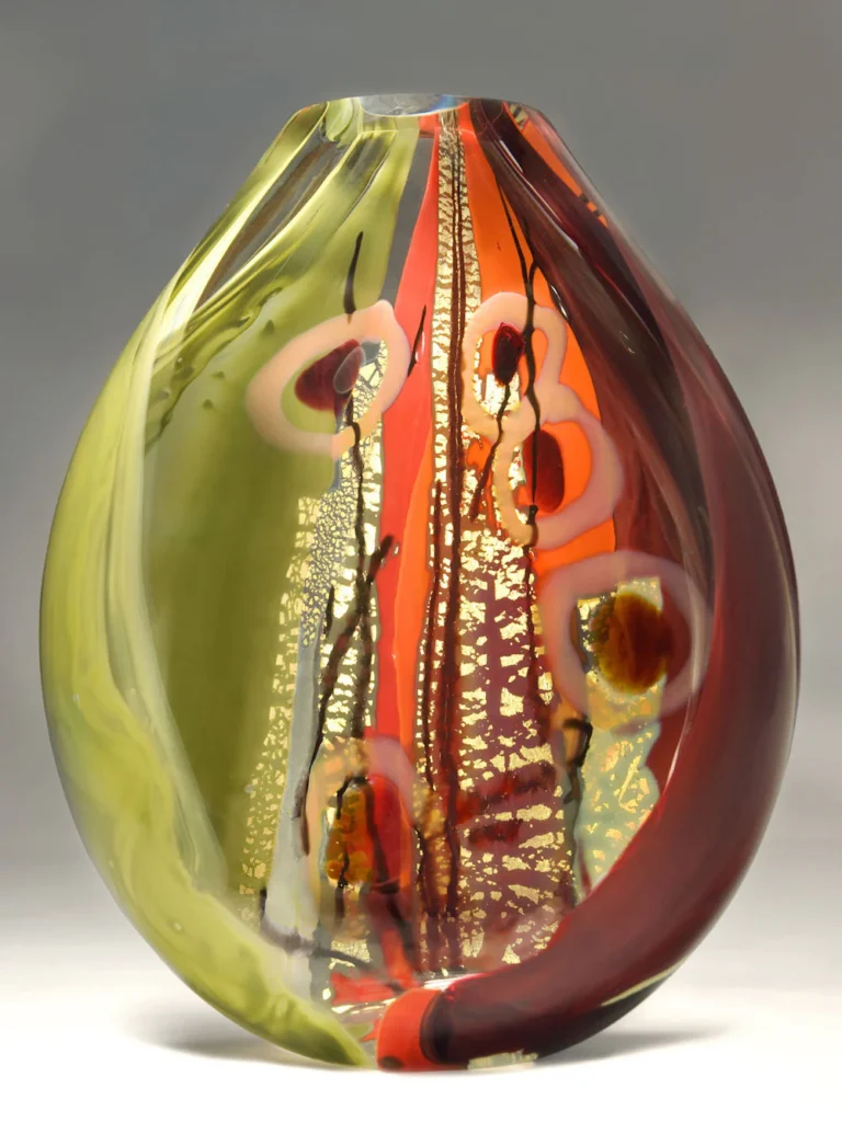 This piece features a combination of burgundy, sage green, and orange glass, and is Solin's homage to Cathedral Rock in Sedona, Arizona. (Photo courtesy of Randi Solin)