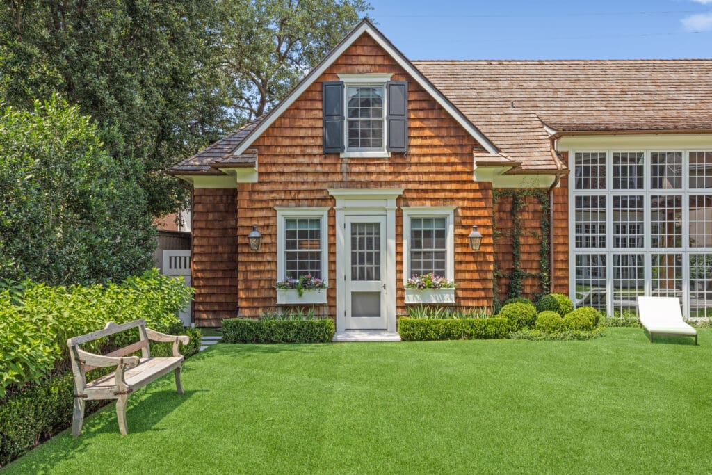 Rebuilt in 2023, the guest quarters' New England-style architecture (and cedar shake shingle exterior) charm and delight. (Photo by Full Package Media / Compass)