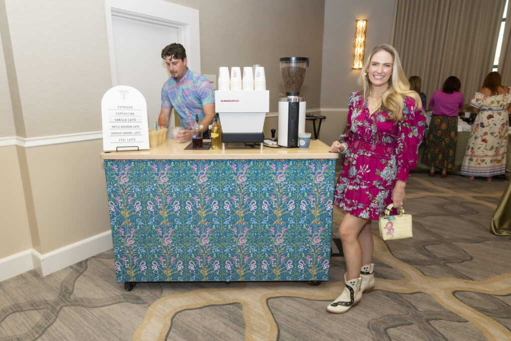 Catherine Cartie with Nightowl Coffee Cart wrapped in her snake art design (Photo by Sharon Ellman, Ellman Photography)