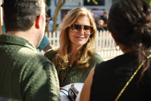 Chefs For Farmers Founder Iris Midler mingling with guests by Dave Rossman