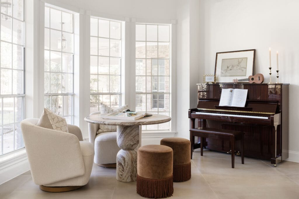 Tucked off the family room, this space is ideal for homework, a coffee break or time at the piano.