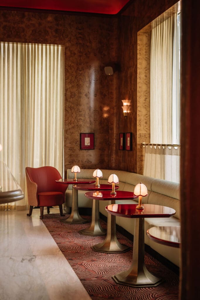 The Mamani space includes a beautiful bar clad in rich burl paneling and fitted with an onyx niche for bottles and glassware behind. (Courtesy)