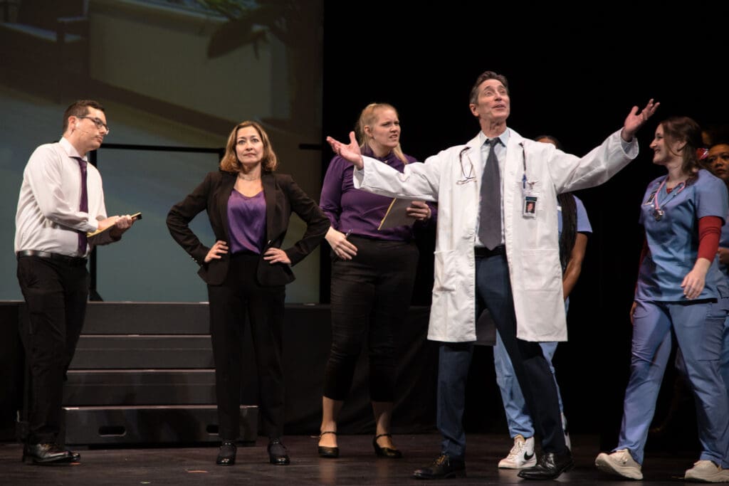 Joel Ponce as Atticus Finch, Tara Taheri as Med-Mal Maggie, Meagan McCullough as Ally McBeal, Marshall Campbell as Dr. McDreamy and Bri Holcombe as Dr. Meredith Grey in Night Court's "Law’s Anatomy: The Juris Doctor Will See You Now" (Photo by Ricornel Productions)