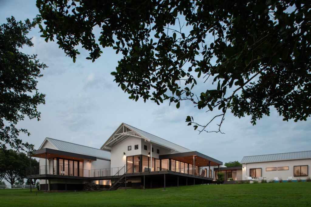 The River Bend Residence, completed in 2023, sits nestled in the Texas countryside along an offshoot of the Brazos River.