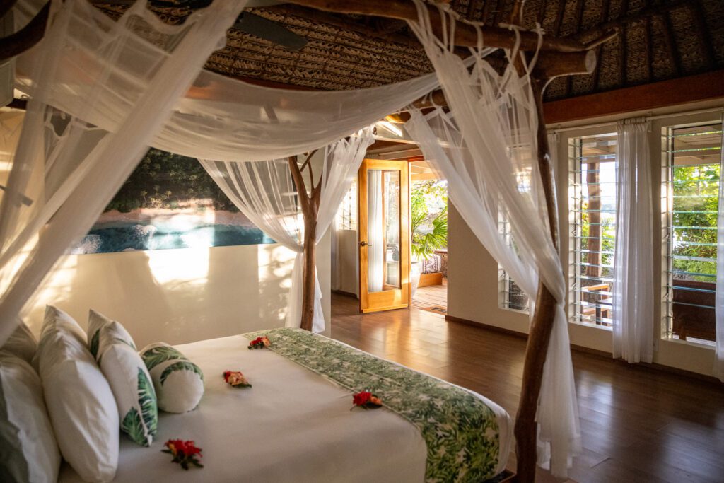 Stay in your bure, lounge on the full-size daybed on its porch, or spend the entire day in the beachside hammock or lounge chairs that are exclusively yours.  (Photo by Turtle Island)