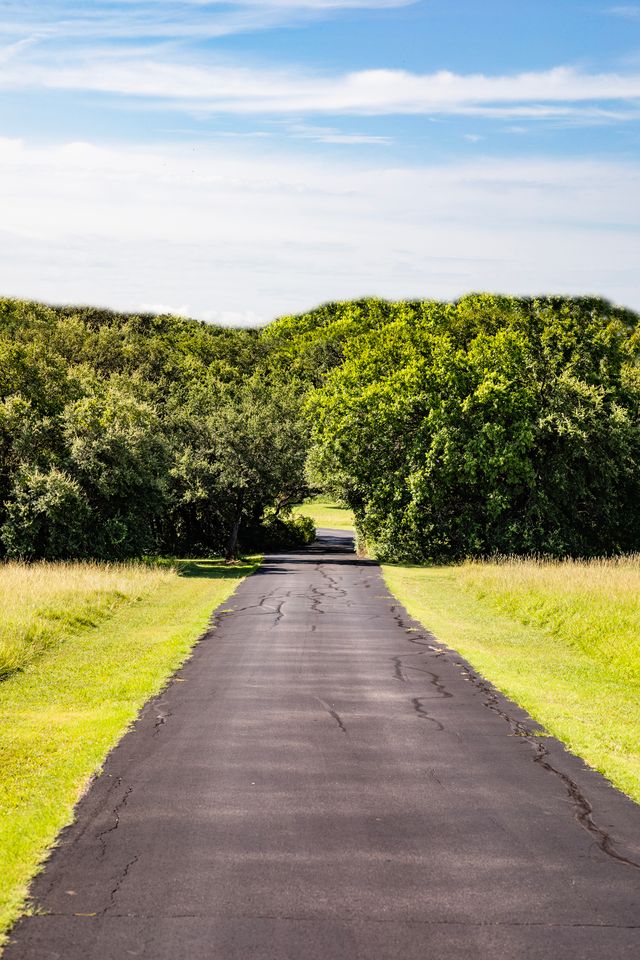 As the first phase of residential home construction continues, dirt roads are being paved throughout Bluejack Ranch. (Photo by The Governale Group)