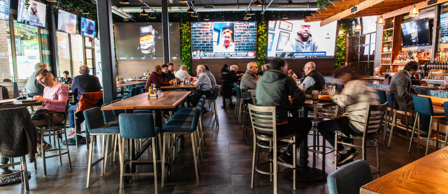 The interior of On the Kirb has plenty of giant screens visible from every seating location. (Photo courtesy of Becca Wright)