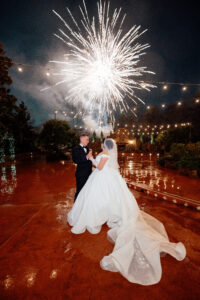 Despite the rain, magical fireworks added to the celebration of Gracie Montes and Ethan Gray's wedding at Madera Estates.
