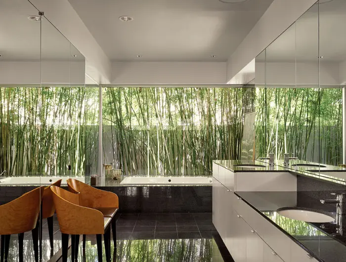 The floor and counters are black granite. Saporiti Italia chairs. 