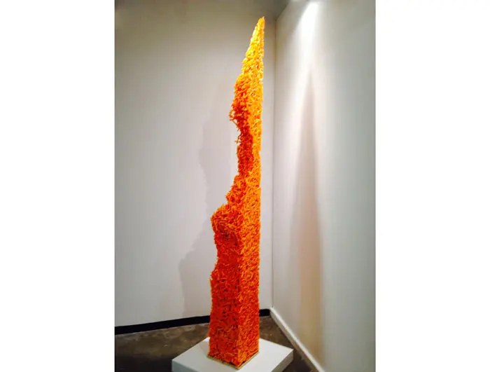 Zieher Smith & Horton's booth, with its Cheetos sculpture by Mike Womack, served as a metaphor for the entire fair-going experience.  
