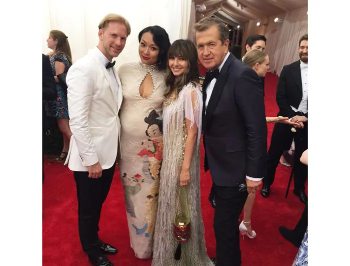 Nasiba Adilova after the ball with Mario Testino, his boyfriend and the Met Gala co-host Veronica Chou 
