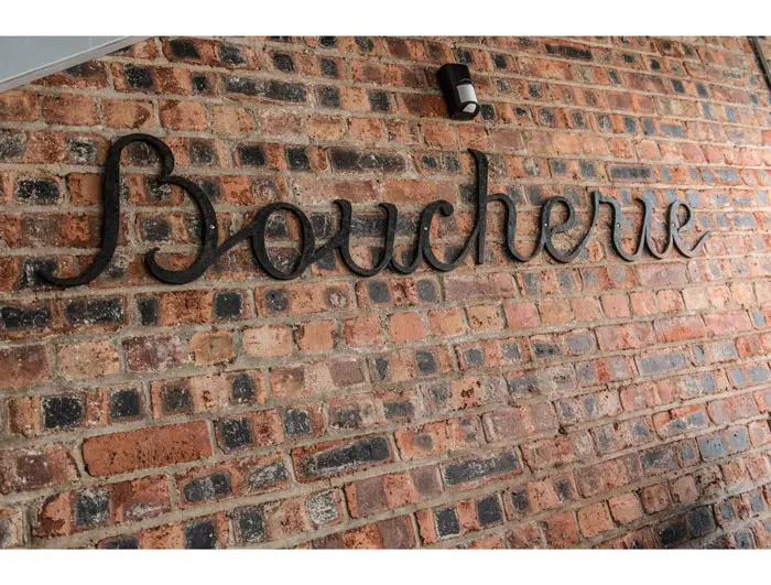 Boucherie sign in butcher shop. Photo courtesy Fulton Davenport. 
