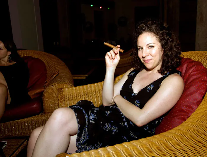 Erin Cluley tries a cigar at the Hotel Nacional.