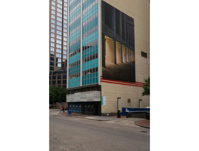 Sharum's "One Main Place" will remain installed long-range into April 2016, dialoging with the modernist facade of 211 North Ervay Street. 