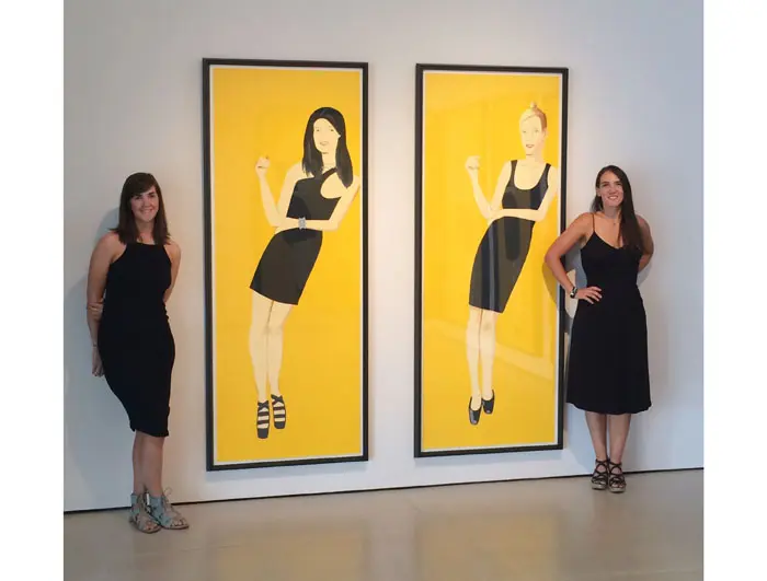 McClain gallerinas Lauren Jamison and Sharon Lott Graham in their own little black dresses pose with Katz's printed ladies. 