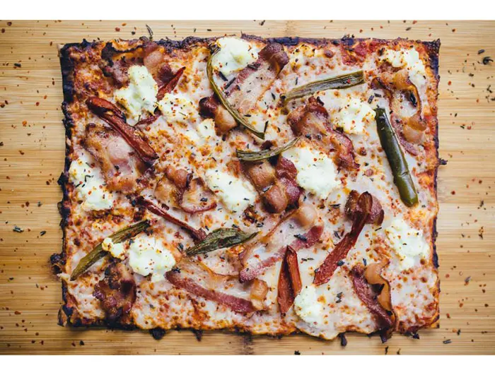 The Drunken Monkey at Boheme. Red sauce, bourbon bacon, smoked jalapenos, ricotta, rosemary & aleppo. Photo courtesy Boheme's Facebook Page. 
