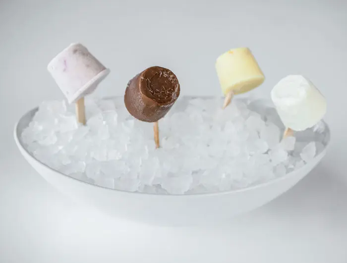 Coconut, Strawberry Cream, Chocolate and Sweet Corn bite size Paletas at Peska Seafood Culture. 