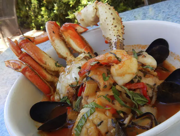 Cioppino at Tony Mandola's. Dungeness crab, mussels, shrimp, fish, scallops, peppers, and potatoes
in a rich broth. 