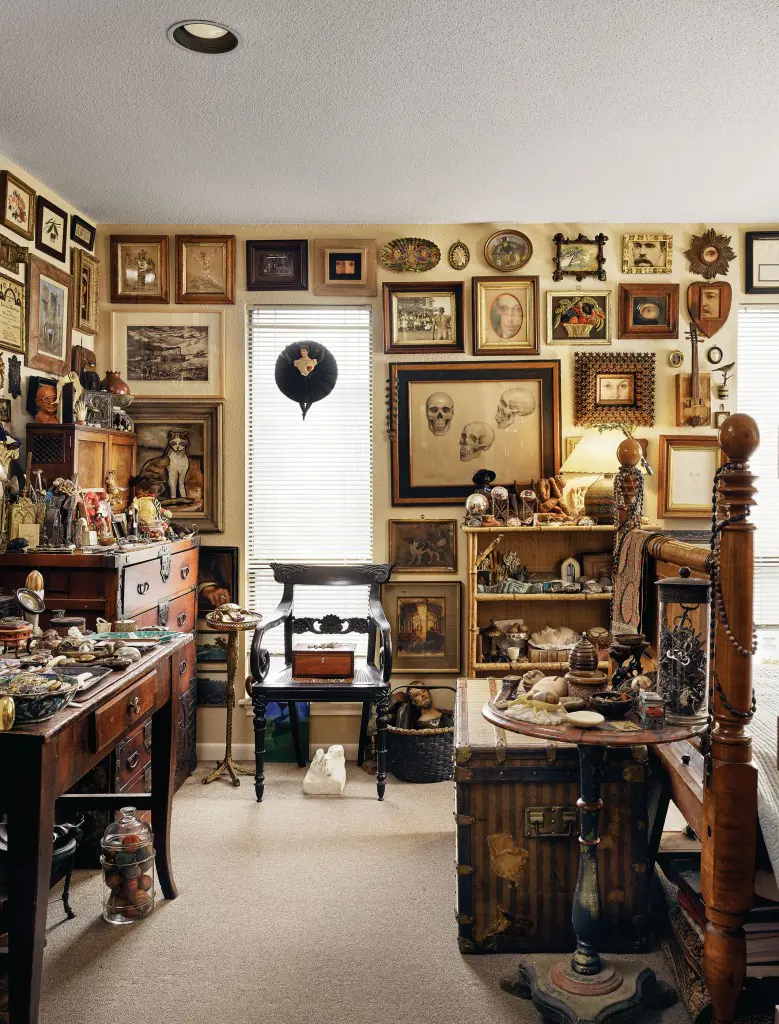 Lackey’s room of curiosities includes a Japanese tansu and an antique Louis Vuitton
trunk. His assemblages hang on the wall alongside folk art and work by other Texas artists, including a drawing of skulls by Harry Worthman.