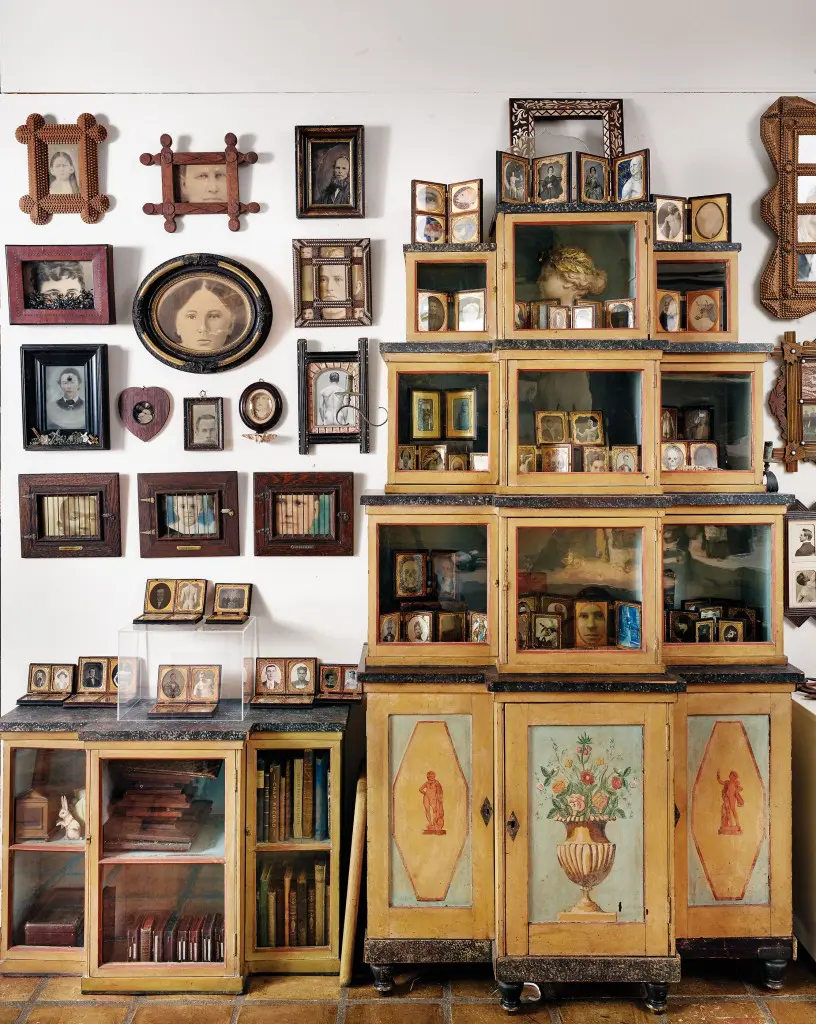 In Lackey’s studio, a hand-painted 19th-century Scandinavian cabinet holds his artwork and books. The works in the room are all by Lackey.