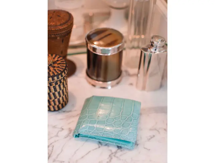 A gift from a dear friend–Powers collects alligator billfolds