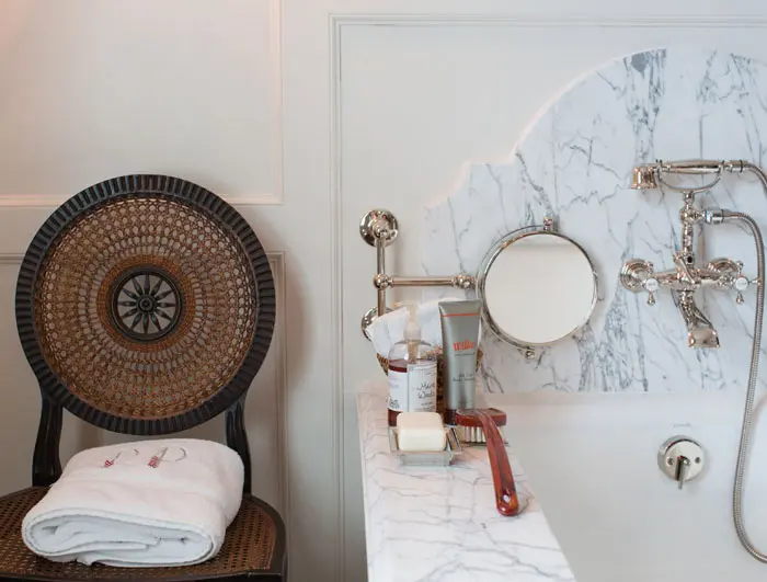 The master bath sits adjacent to one wing of Powers' closet