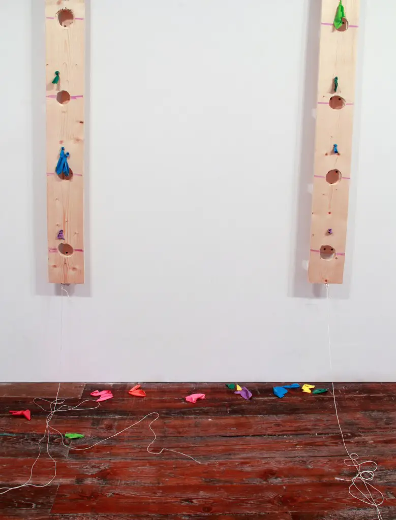 Kinnaird's kinetic sculpture "The Sky is Falling," 2015, exploded balloons during the opening. The remains are quite poignant. Photo courtesy Iva Kinnaird.