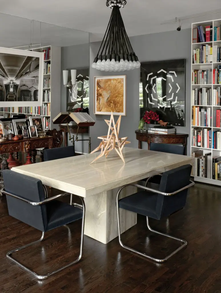 A table and chairs purchased from the Transco Tower are repurposed in the dining room.