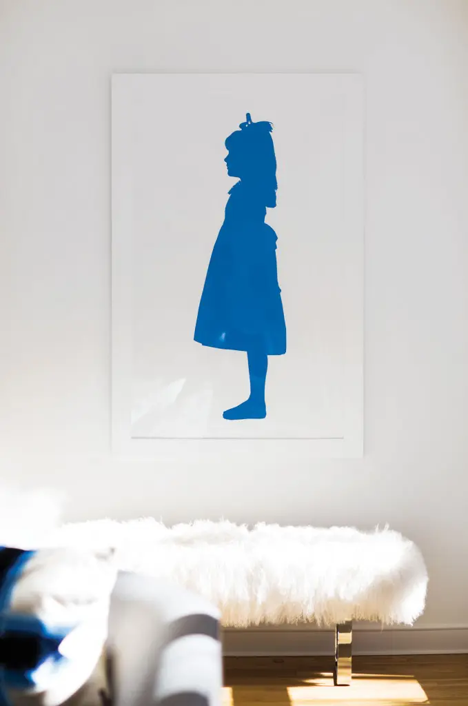 Edwardian-style silhouette rendered in cobalt by photographer Fredrik Broden. Mongolian fur and chrome bench from Nest.
