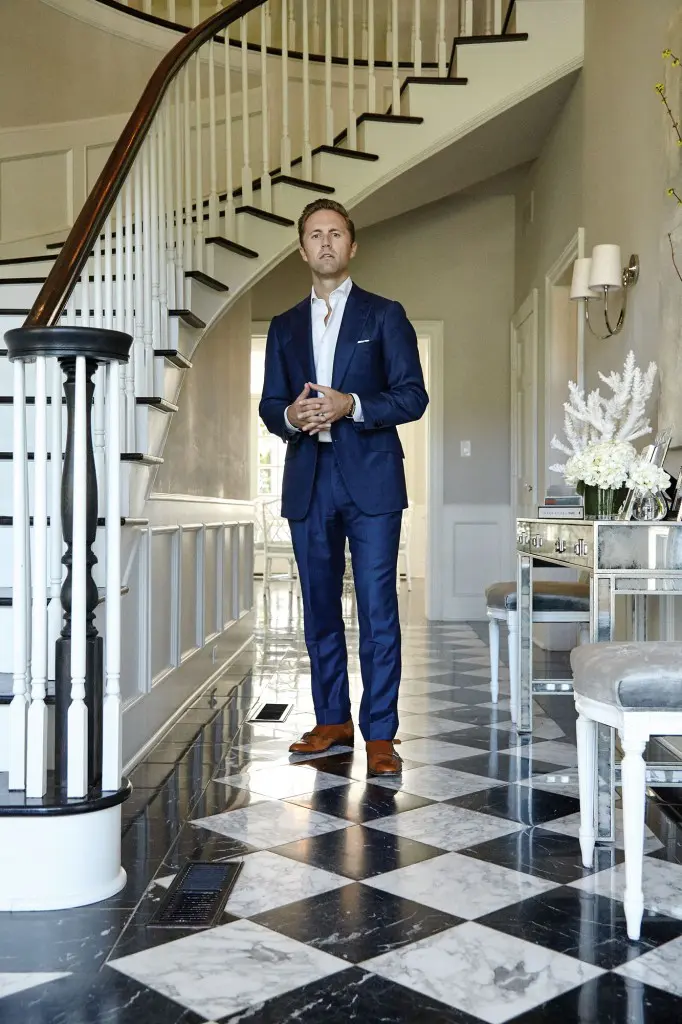 Melbourne O'Banion stands in the couple's home.