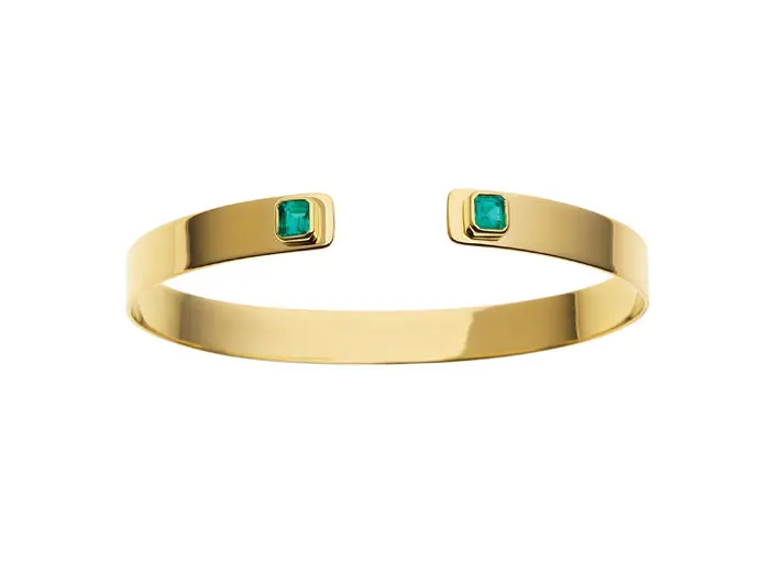 This small open cuff with bezel-set emeralds is perfect stacked or as a stand-alone stunner.