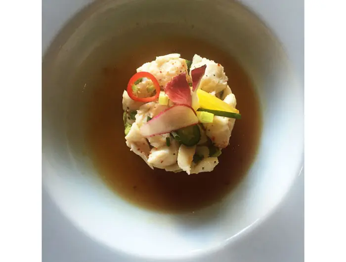 Table on Post Oak's colossal lump crab salad serves as a first-course option on both the lunch and dinner menu. It is served with black radish, avocado, cilantro, jalepeños and citrus dressing. 