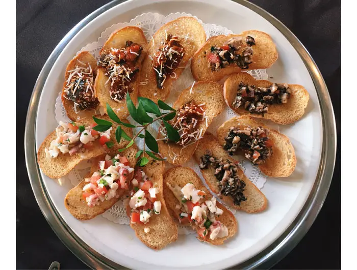 A trio of crostini at Arcodoro. Crostini Misto Terra, Bruschetta, Funghi & Pomodoro and Crostini Misto Mare. 