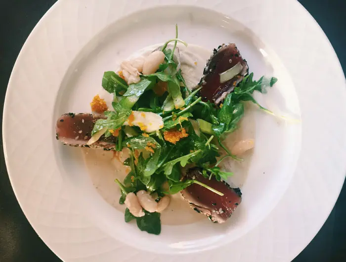 Tonno e Bottarga is on the Sardegna at Arcodoro. Seared and marinated Ahi tuna, red onions, rucola, celery, cannellini beans, bottarga shavings with a bottarga sauce. 