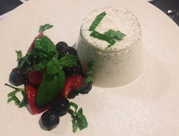 The Pannacotta alla Frutta serves as the dessert for Arcodoro's vegetarian menu. It is a traditional custard finished with raspberries and Saba. 