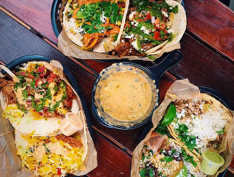 Add a side of queso to your tacos at Torchy's. 