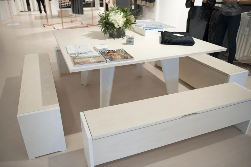 Each Kit and Ace shop showcases a supper club table.