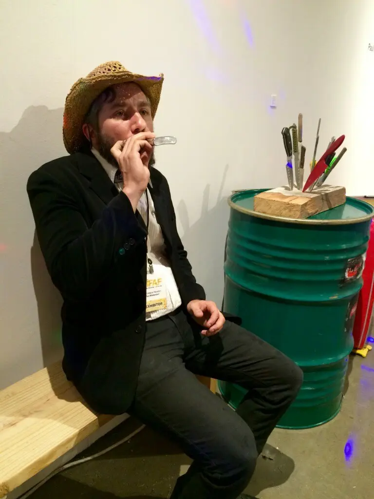 Paul Middendorf took over the Art League of Houston booth with an endearing performance.