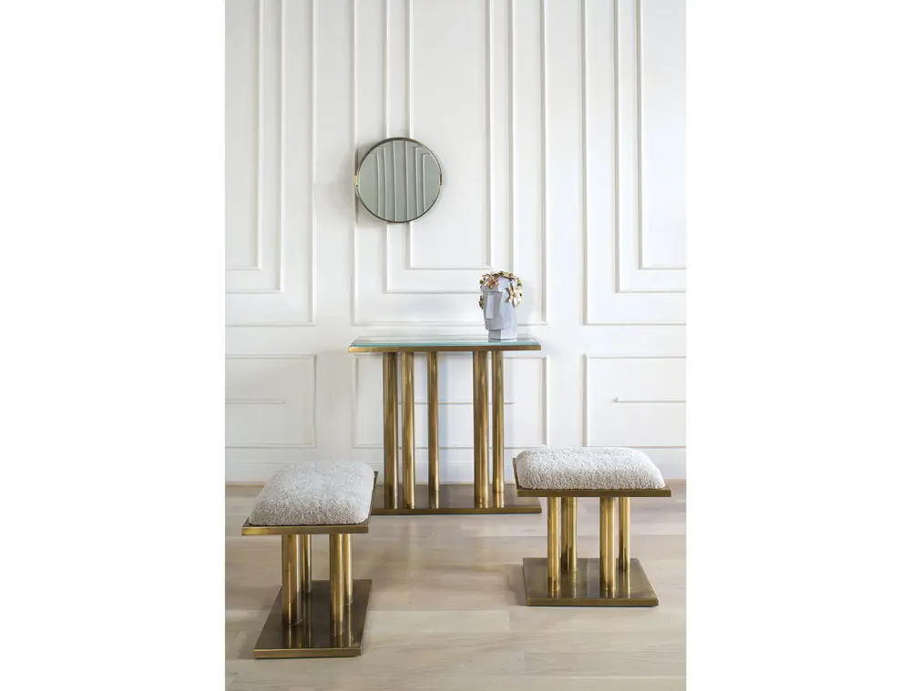 Holmby console in burnished bronze and glass; upholstered Holmby stools in burnished bronze