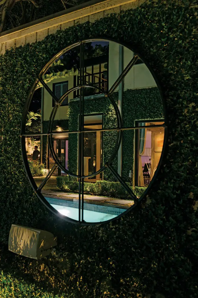 One of multiple outdoor mirrors that create a trompe l’oeil effect.