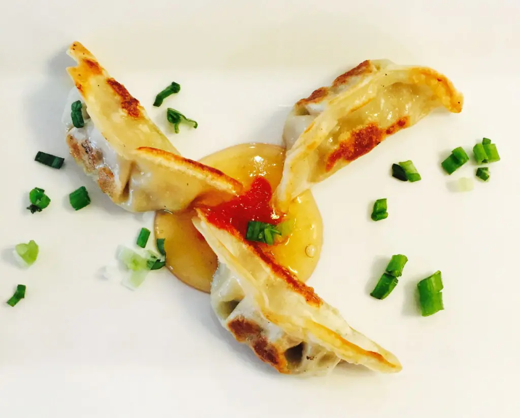 The Chinese pot stickers at White Oak Kitchen + Drinks are stuffed with vegetables and served with a spicy plum sauce. 