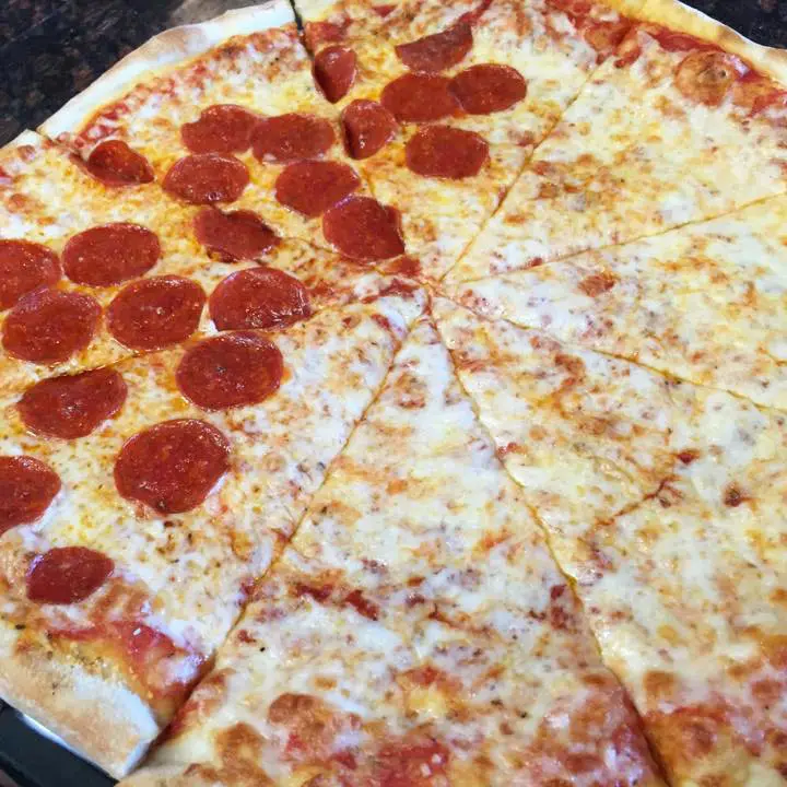 Romano's offers a classic New York-style bite. (Photo courtesy Romano's Pizza's Facebook Page)