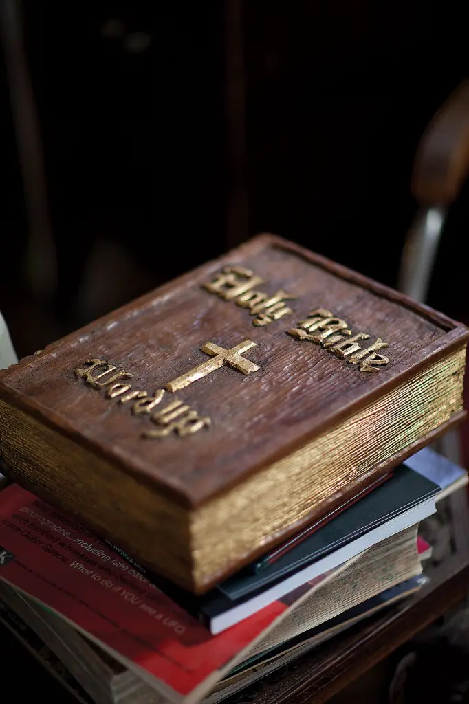 Contemporary Texas talent Camp Bosworth, based in Marfa, is in the couple’s stable. Bosworth’s "Carved Wood Holy Bible – Word Up," sits upon a stack of ephemera. 