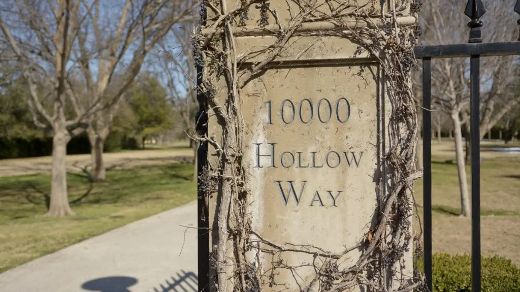 Beyond this simple shingle is the most expensive mansion in Texas.
