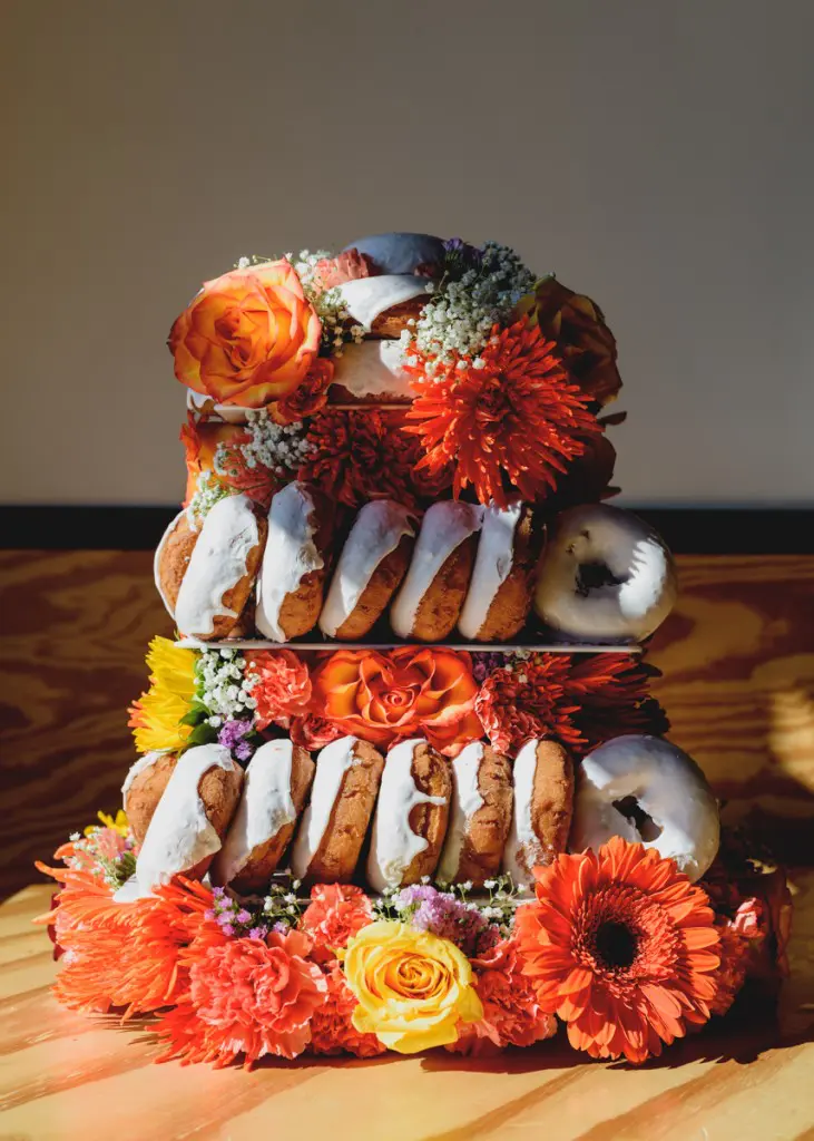 If you're not a fan of wedding cake, opt for a tiered donut cake like this one from Hugs & Donuts. 