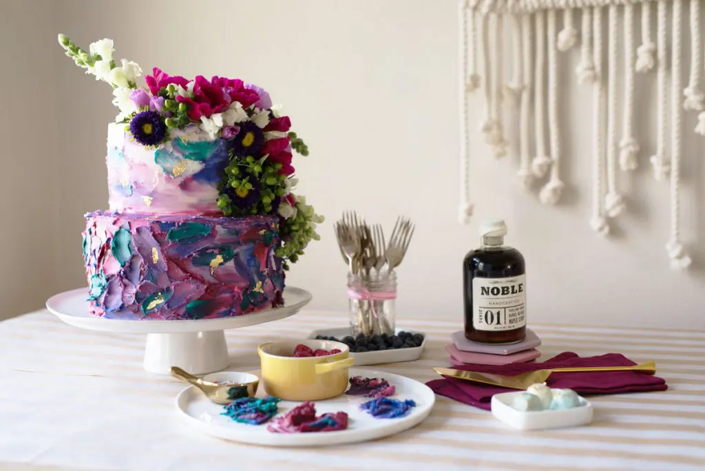 Maple & Love proprietor Lisa Driver drew her inspiration from a painting for this colorful wedding cake. 
