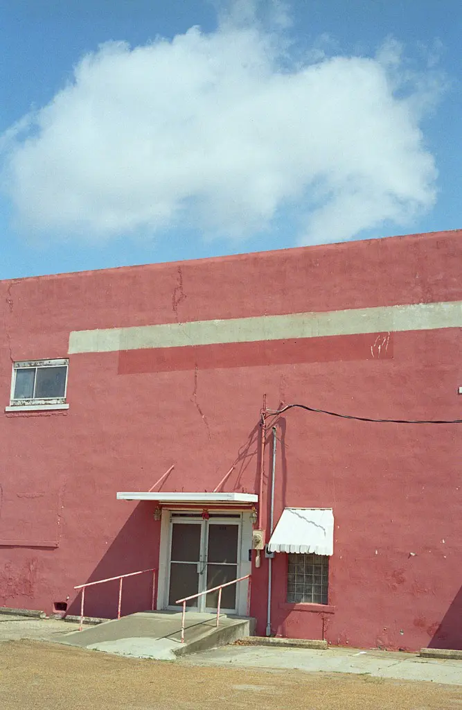 The simple, straightforward facade of Fuku Restaurant, in Greenwood, Mississippi, evokes the aesthetic of some of Akin's photographic heroes. 