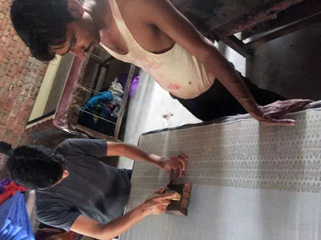 Blockprinters hand stamp each section of fabric using wooden blocks. The print is intentionally imperfect.