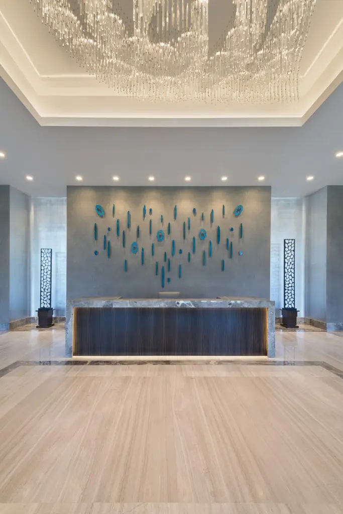 The concierge desk at the Belfiore anchors a rather dramatic setting.